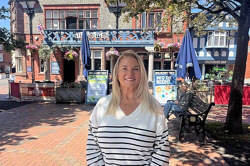 Diane outside the Mulberry Tree Inn