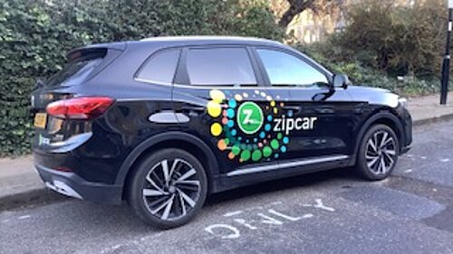 A Zip Car parked on an Islington street