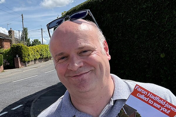 Faron Hadfield-Jones with leaflet