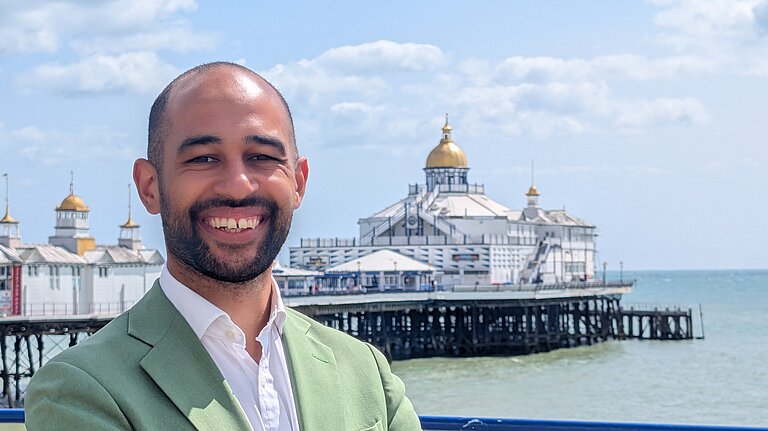 Josh stood by the pier. 