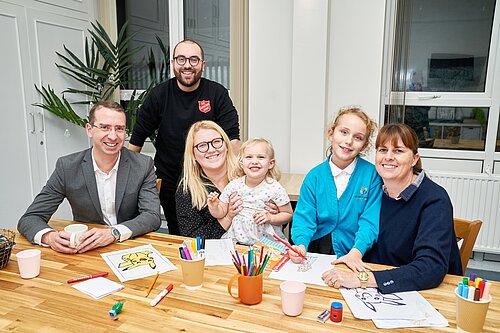 Peter and a family at a Watford welcoming space