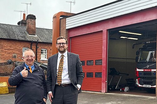 Freddie and Councillor Leigh Rawlins outside Henley Fire Station