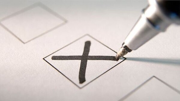 A cross on a ballot.