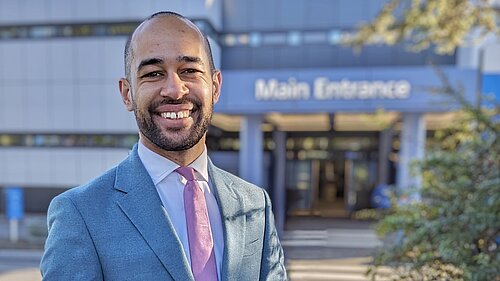 Josh Babarinde in front of Eastbourne District General Hospital