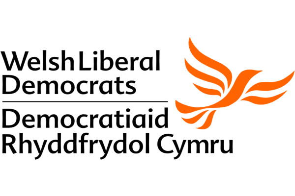 "Welsh Liberal Democrats" beneath the bird in flight in orange