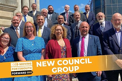 Portsmouth's Liberal Democrat councillors stood in front of Portsmouth Guildhall
