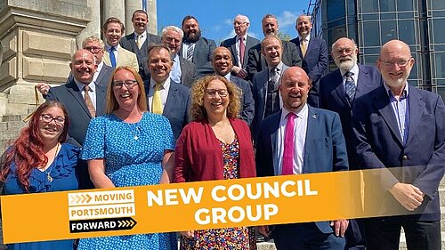 Portsmouth's Liberal Democrat councillors stood in front of Portsmouth Guildhall