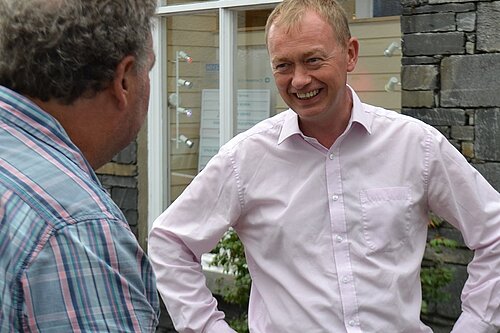 Tim listening to a resident