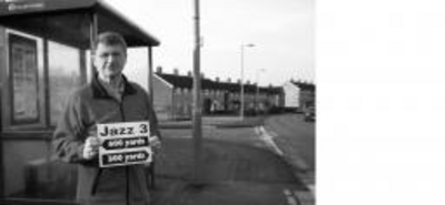 Councillor Ron Hussey at the redundant bus stop at Pinkerton road/Stag Hill junction