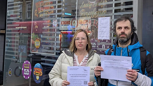 Cllr Claire Bonham and Yusuf Osman outside the adult gaming centre on The Triangle