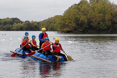 Sir Ed Davey MP and other Lib Dems in a canoe they built to highliht the call for action on Thames Water