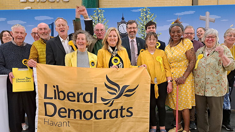 Havant Liberal Democrats Team on stage after the elections