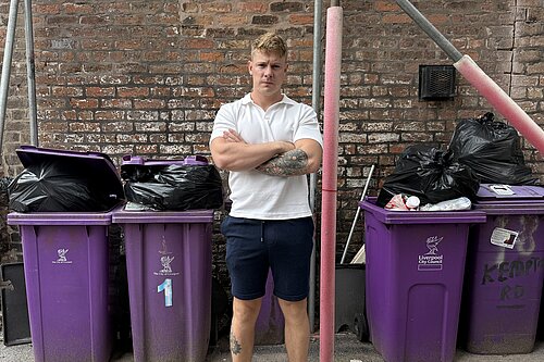 Carl Cashman in front of Bins