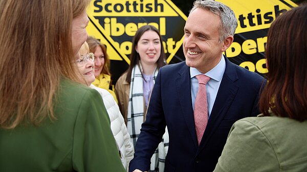 Alex Cole-Hamilton and activists