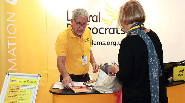 A Conference Steward speaking to a delegate