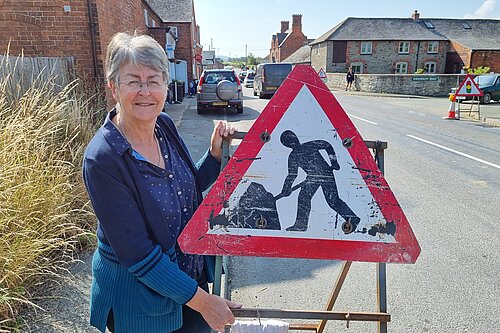 Councillor Heather Kidd with roadworks