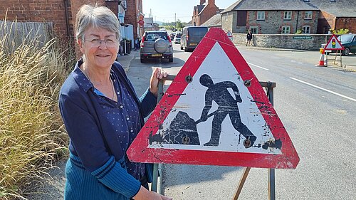 Councillor Heather Kidd with roadworks