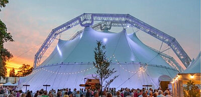 A huge tent with a Wembley-style arch over the top