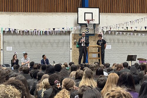 Freddie speaking to pupils at Wheatley Park School