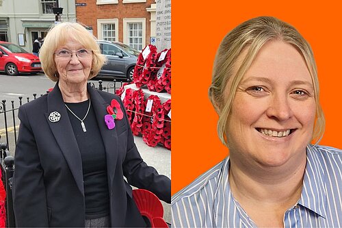 Cllr Cath Gleadow stood in front of a remembrance memorial, and Cllr Sally Howell in front of an orange background