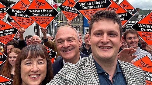 David Chadwick, Sir Ed Davey and Jane Dodds MS take a selfie with Lib Dem Activists.