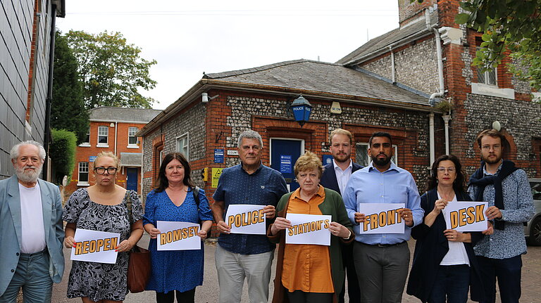 Liberal Democrat campaigners outside Romsey's police station