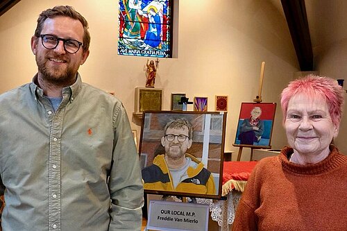 Freddie with the portrait and artist