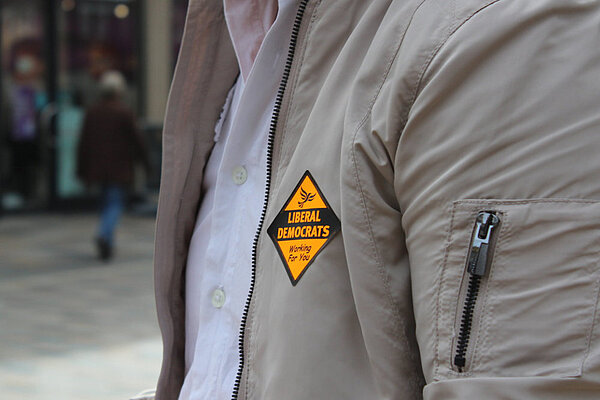 Lib Dem sticker A person's jacket displaying a Liberal Democrat sticker