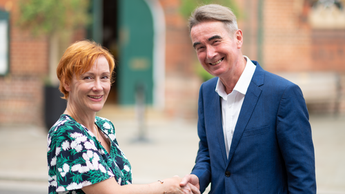 Stephen Conway shaking hands with Lou Timlin outside Wokingham Town hall