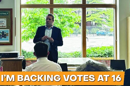 Tom Morrison talking to school children