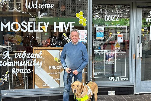 Philip Mills and guide-dog Mason in Moseley 