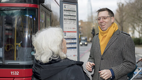 Rob Blackie pictured next to a bus stop 