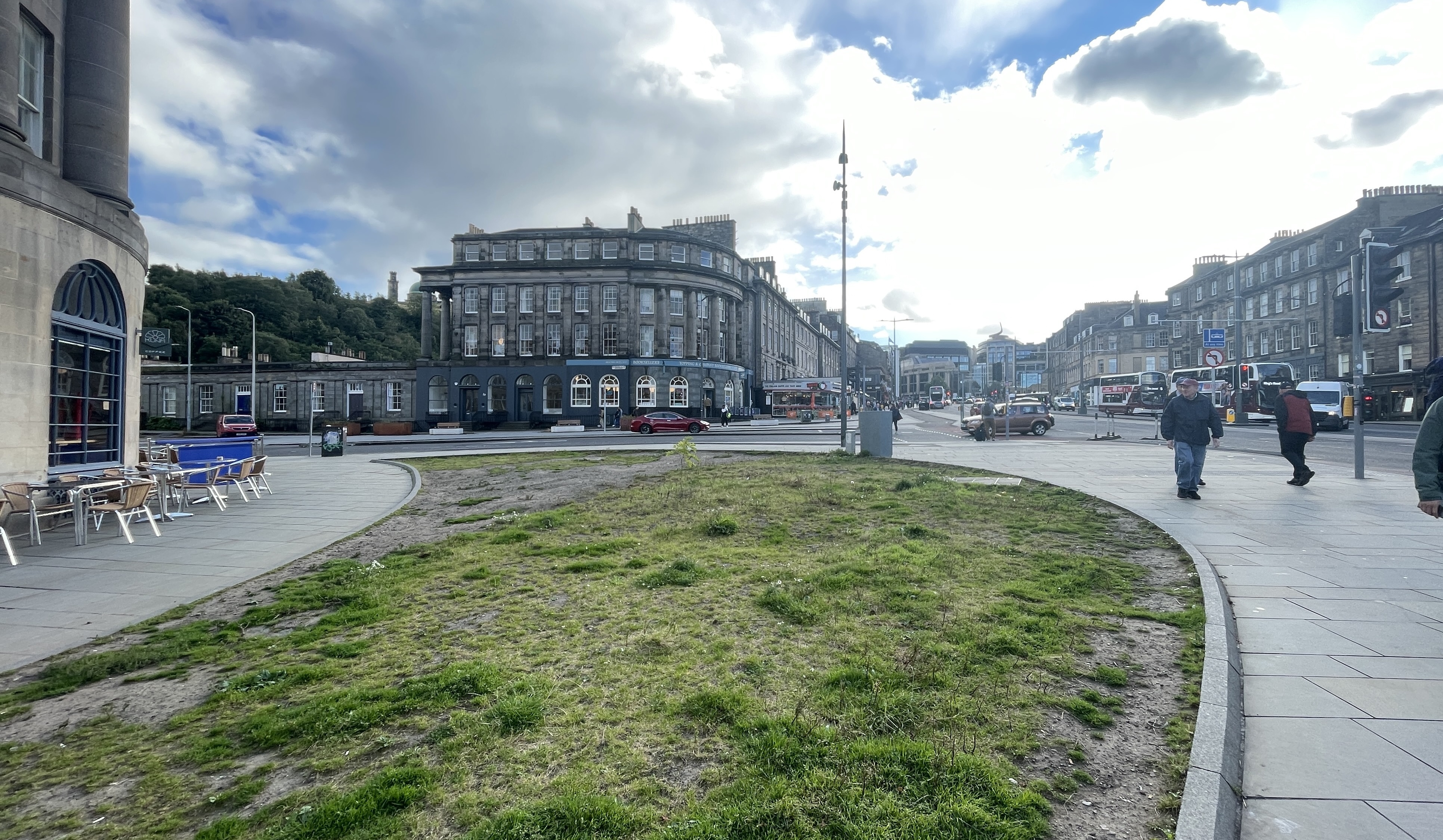 The corner of London Road and Elm Row on a lightly clouded day